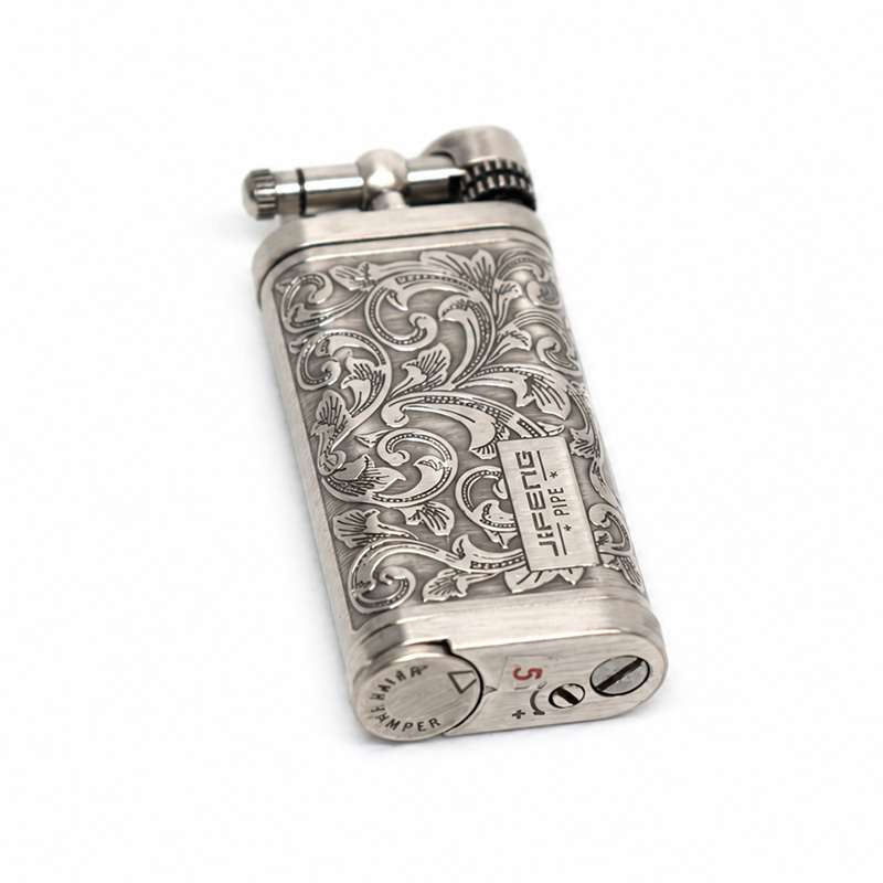 Jifeng silver pipe lighter with an elegant engraved design and angled flame