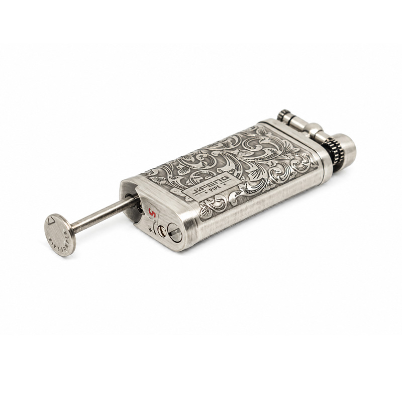 Jifeng silver pipe lighter with an elegant engraved design and angled flame